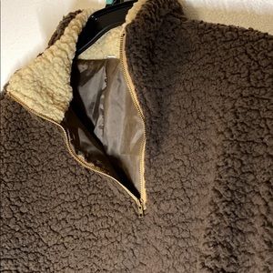 Brown teddy bear jacket zipped up crewneck